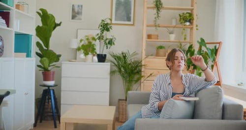 Reflective Woman Closing Book