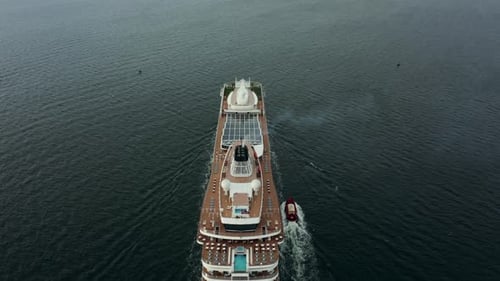 Drone Shot of a Luxury Large Cruise Ship Sailing at Full Speed on Open Water