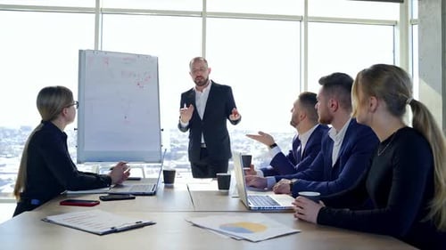 Corporate Meeting Presentation in Modern Office