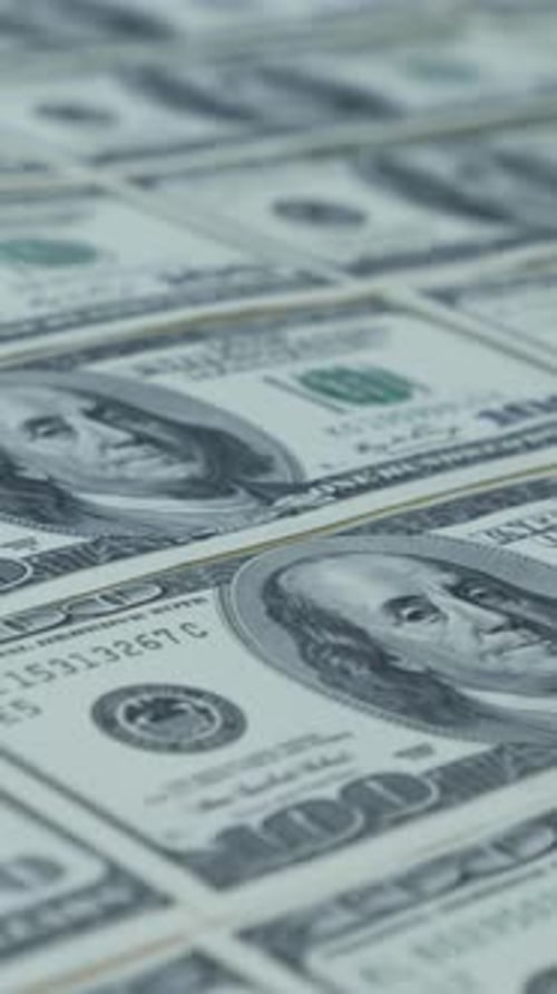 Stack of crisp one hundred dollar bills