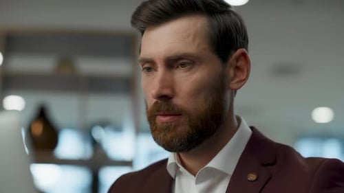 Disappointed Boss Shaking Head at Office Closeup. Nervous Manager Solving Problems Working