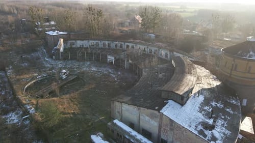 Aerial view of old and abandoned locomotive depot in sunny day. Polish railways. Pyskowice, Poland.