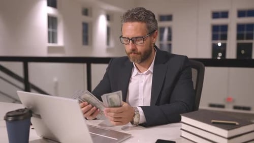 Speed Up Earn Money Accelerated Video of Business Man Counting Dollars in Office Office Worker in