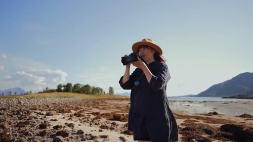 Beach Photography Bliss Young Casual Woman Taking a Photo of a Beautiful Landscape