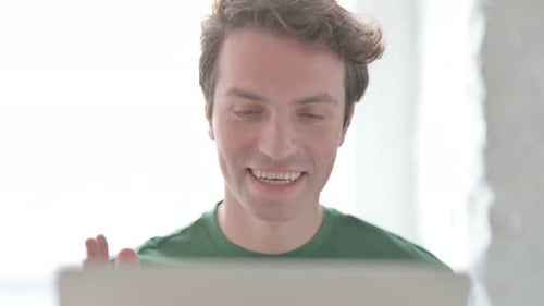 Close Up of Young Man Doing Video Chat on Laptop
