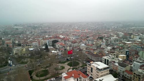 Turkish flag near the Fatih Memorial Park in Istanbul circling and zooming shot