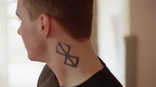 Boxer Portrait Inside Gym Wearing Black Sportswear Showing Focused