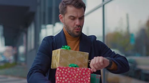 Close Up Serious Attractive Man with Christmas Present Look at Clock Hurry Walking Portrait Handsome