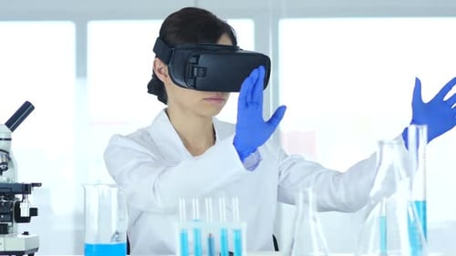 Woman in VR Headset Gesturing in a Lab