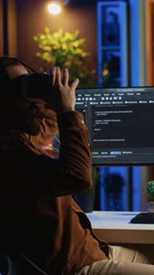 Young Adult Using VR Headset at Night