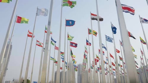 National Flags in City Waving Gently