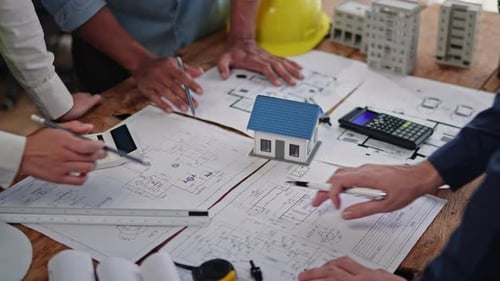Remue-méninges et évaluation des estimations sur les dessins de construction, la conception, l'architecture et l'ingénierie