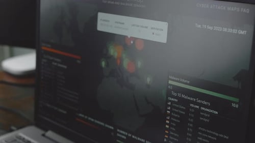Computer Screen Showing Cyber Attack Map With Data