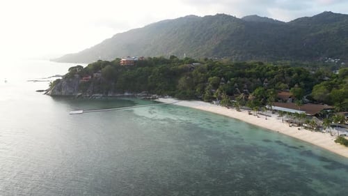 Stunning drone sunset scenery over bay on beautiful tropical island