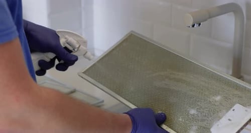 Cleaning Mesh Filter of Cooker Hood Using Spraying Cleaning Solution