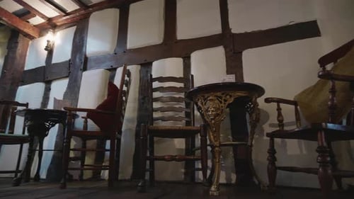 a traditional seating arrangement in an old victorian pub