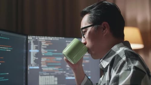 Close Up Of Programmer Drinking Coffee While Creating Software Engineer Developing App, Program