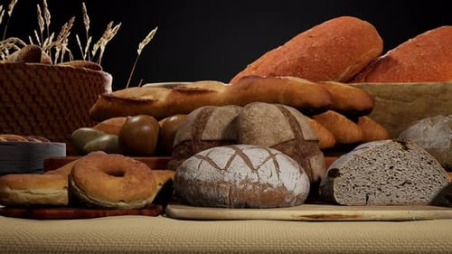 Still Life Assortment of Freshly Baked Artisan Bread with Wheat