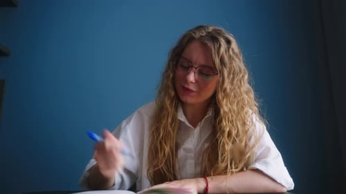 Friendly Woman Talking on Video Conference Call