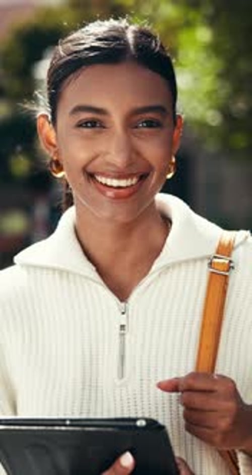 Face, student and indian woman with tablet for education, academic confidence and happy in college