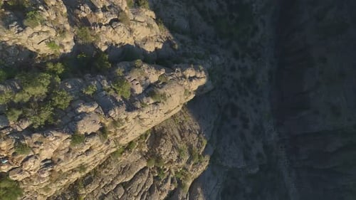 Aerial View Two Friends Pose at the Canyon s Edge With Majestic Views of Turkey