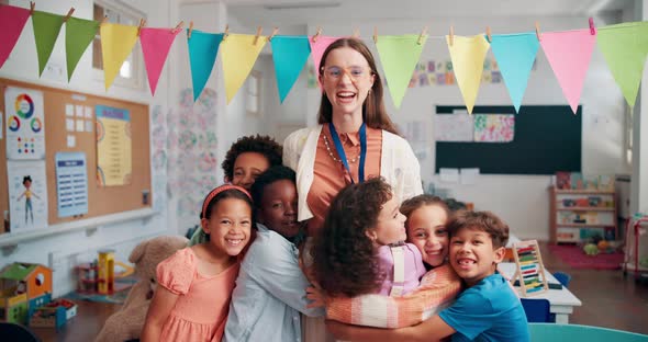Woman, face and hug children in classroom, teacher and support with ...