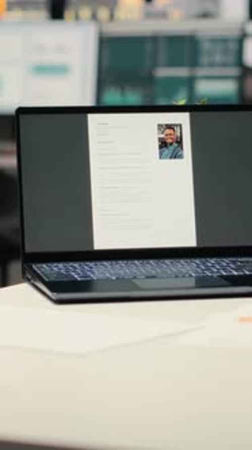 Vertical Video Laptop in Empty Corporate Space Shows Applicant CV Before Hiring Interview