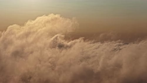 Golden Cloudscape at Sunrise Aerial Shot