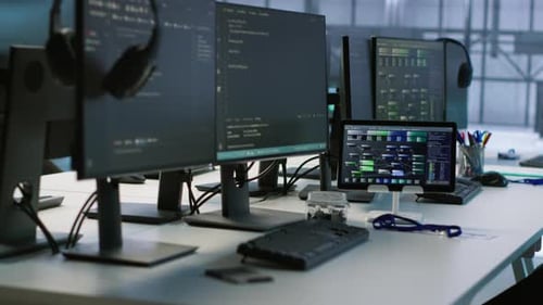 Modern Office Desks with Computers and Monitors