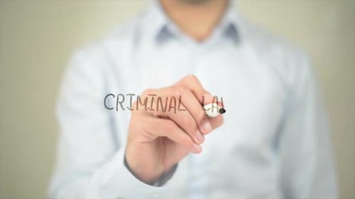 Criminal Law, Man Writing on Transparent Screen