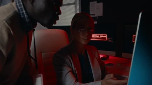 System Error at a Computer in Dark Office