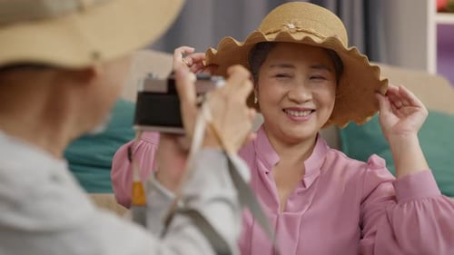 Senior Woman Posing for a Photograph Indoors