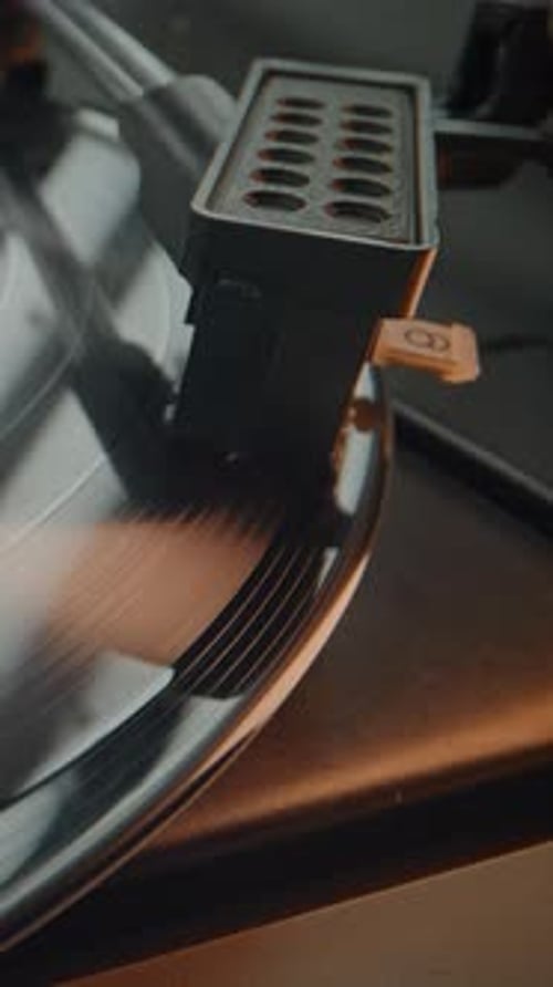 Vinyl Record Player Spinning Vertical Close-Up