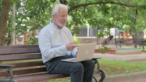 Senior Man on Laptop Talking on Video Call