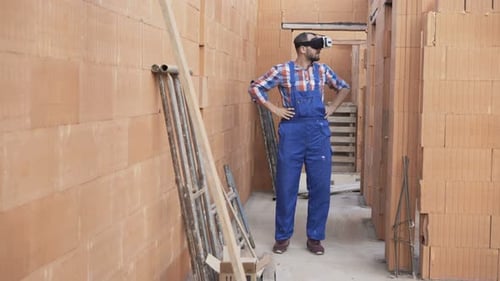 Man with VR Headset in Unfinished Building