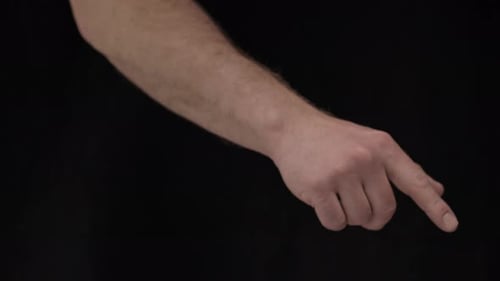 Mans hand acting as if using touch screen