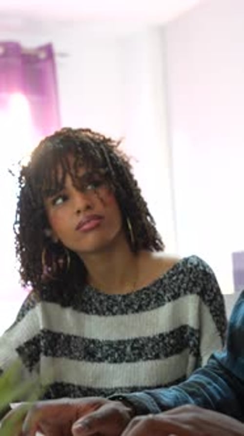 Young Adults Studying Together at Home