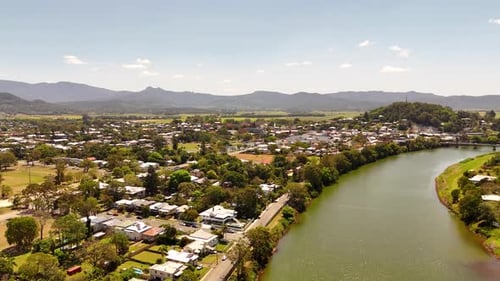 Drone footage travelling north along the Tweed River with Murwillumbah on the left