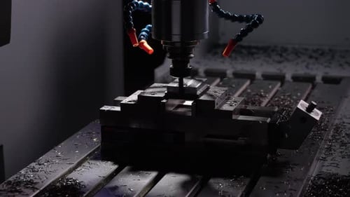 CNC cutting a piece of metal p4