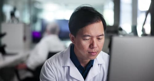 Scientist Smiling in Modern Laboratory Workplace
