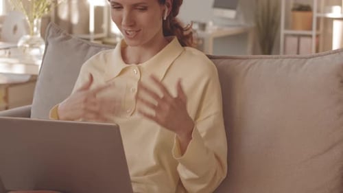 Woman on Laptop Video Call From Home