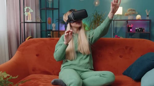 Woman Experiencing Virtual Reality with Headset at Home