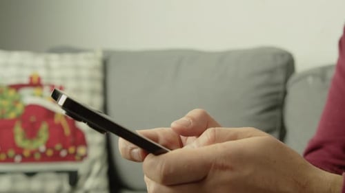 Student Browsing Online Credit Card Shopping And Smartphone Chatting