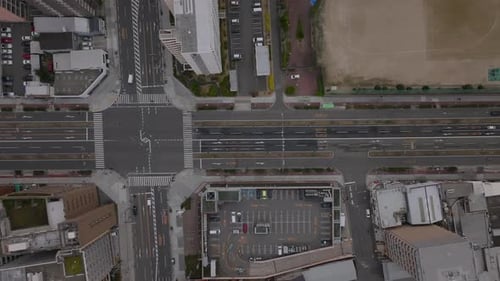 Birds Eye Shot of Transport Infrastructure in City Vehicles Driving on Wide Multilane Road in Urban