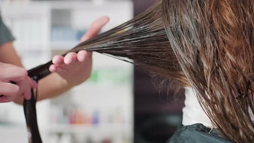 Focused Image Capturing Hairstylist Shaping Wet Hair with Tools Detailed View of Professional Barber