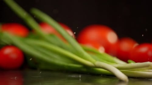 a Bunch of Cherry Tomatoes are Sitting on a Table