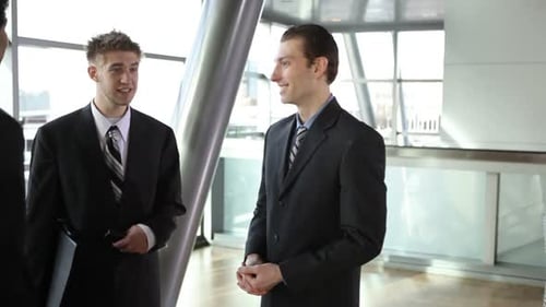 Businesspeople Meeting and Talking 20-25