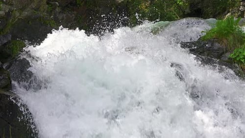 Clear Water Splash in Mountain Stream Cascade Waterfall Slow Motion