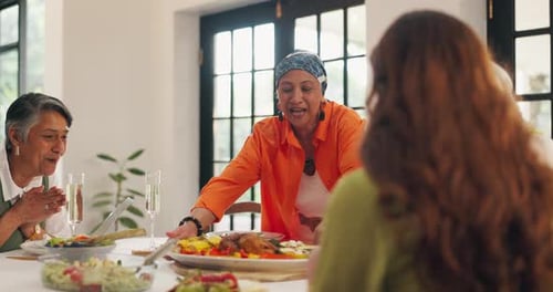 Women Enjoy Meal Together at Home Indoors