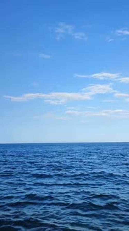 Sea View View Blue Sea Waves Blue Sky White Clouds Horizon Line Day Vertical